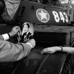 VIET NAM. David CHRISTIAN, a highly decorated Viet Nam veteran, with his daughter on a tour of the country. He carried with him10x8 glossy photographs of himself in full military regalia, one of which he placed on the tank that broke through the gates of the presidential palace in 1975.