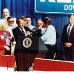 David offers Ronald Reagan his coat David offers Ronald Reagan his coat