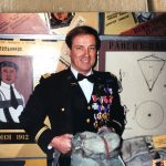 David Christian holding an original Russian parachute David Christian holding an original Russian parachute